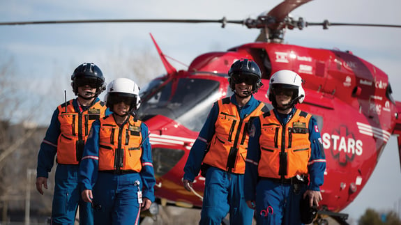 STARS pilots unloading helicopter